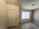 Open-concept living room with tile flooring, neutral paint and natural light at 1918 S Ocotillo Dr, Apache Junction, AZ 85120