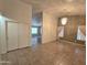 Spacious living room boasting tile flooring, neutral walls, and an entrance to the kitchen at 1918 S Ocotillo Dr, Apache Junction, AZ 85120