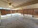 Large screened-in patio with multiple ceiling fans and ample natural light at 1918 S Ocotillo Dr, Apache Junction, AZ 85120