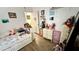Bright bedroom with a daybed, storage drawers, and personal touches creating a cozy space at 2060 N Center St # 275, Mesa, AZ 85201