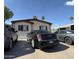 Well-maintained home exterior with a neat parking area showcasing the property's curb appeal at 2060 N Center St # 275, Mesa, AZ 85201
