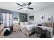 Stylish bedroom with a unique decor, comfortable bed, and lots of natural light at 2111 E Rawhide St, Gilbert, AZ 85296