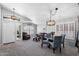Inviting living room featuring vaulted ceilings and plenty of natural light at 2111 E Rawhide St, Gilbert, AZ 85296