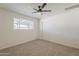Bedroom with neutral carpet, ceiling fan and closet space at 2130 W Cindy St, Chandler, AZ 85224