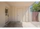 Spacious carport area with access door, offering convenient covered parking and storage options at 2130 W Cindy St, Chandler, AZ 85224