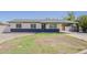 Charming single-story home with brick accents and a covered carport, set on a well-maintained lot at 2130 W Cindy St, Chandler, AZ 85224