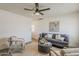 Bright living room with stylish furniture, ceiling fan, and neutral decor creating a cozy atmosphere at 2130 W Cindy St, Chandler, AZ 85224