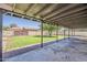 Covered patio overlooking a well-maintained lawn and block fence at 2130 W Cindy St, Chandler, AZ 85224