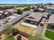 Community aerial view of a home featuring a patio, shed, lawn, and fenced yard at 2264 W Arroyo Way, San Tan Valley, AZ 85144