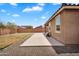 Expansive backyard featuring a large, covered patio and low-maintenance landscaping at 2264 W Arroyo Way, San Tan Valley, AZ 85144