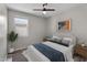 Cozy bedroom featuring a plush bed, soft lighting, and stylish decor at 2264 W Arroyo Way, San Tan Valley, AZ 85144