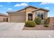 Well-maintained single-story home with a two-car garage and drought-tolerant landscaping at 2264 W Arroyo Way, San Tan Valley, AZ 85144