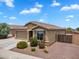 Charming single-story home with a two-car garage and well-manicured landscaping at 2264 W Arroyo Way, San Tan Valley, AZ 85144