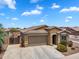 Inviting home with a spacious driveway and a beautifully landscaped front yard at 2264 W Arroyo Way, San Tan Valley, AZ 85144