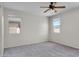 Spacious main bedroom showcases great natural lighting from two windows at 2264 W Arroyo Way, San Tan Valley, AZ 85144