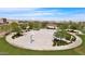Aerial view of the community basketball court, benches, and lush landscaping at 22944 E Via Del Oro --, Queen Creek, AZ 85142