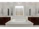 This large bathroom features a garden tub with and sinks, perfect for relaxation at 22944 E Via Del Oro --, Queen Creek, AZ 85142