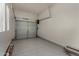 Garage interior with epoxy flooring, overhead door, and garage door opener at 22944 E Via Del Oro --, Queen Creek, AZ 85142