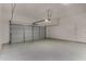 Spacious garage with epoxy flooring, overhead door, and garage door opener at 22944 E Via Del Oro --, Queen Creek, AZ 85142