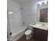 Clean bathroom featuring a shower-tub combo, toilet, and vanity with sink at 2323 E Huntington Dr, Phoenix, AZ 85040