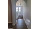 Hallway view leading to staircase and a hanging pendant lighting at 2323 E Huntington Dr, Phoenix, AZ 85040
