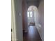 Hallway view leading to staircase and a pendant lighting fixture at 2323 E Huntington Dr, Phoenix, AZ 85040