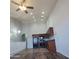 Open kitchen area with vaulted ceilings and modern lighting fixtures at 2323 E Huntington Dr, Phoenix, AZ 85040