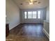 Spacious living room with bay window with adjacent Kitchen at 2323 E Huntington Dr, Phoenix, AZ 85040