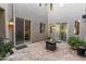 Private courtyard with a fire pit, creating a cozy outdoor retreat for relaxation and gatherings at 26036 N 85Th Dr, Peoria, AZ 85383