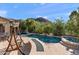 Backyard pool with beautiful mountain views and mature trees at 26036 N 85Th Dr, Peoria, AZ 85383