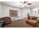 Relaxing living room featuring a neutral palette, large windows, and cozy seating at 2759 E Balsam Dr, Chandler, AZ 85286