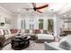 Spacious living room features a large sectional sofa, decorative pillows, and natural light at 2759 E Balsam Dr, Chandler, AZ 85286