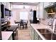 Open floorplan, combining the kitchen with eat in kitchen and dining table at 286 W Palomino Dr # 78, Chandler, AZ 85225