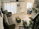 Open living space with contemporary furnishings, inviting seating, and a view of the adjacent dining area at 286 W Palomino Dr # 78, Chandler, AZ 85225