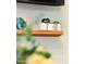 Charming living room shelf decor with elegant decorative features at 286 W Palomino Dr # 78, Chandler, AZ 85225