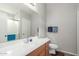 Well-lit bathroom features a single sink vanity, with a shower and toilet at 29151 N Lilly Ln, San Tan Valley, AZ 85143