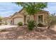 Inviting single-story home with a two-car garage and mature landscaping in a desirable neighborhood at 29151 N Lilly Ln, San Tan Valley, AZ 85143
