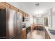 Bright kitchen featuring stainless steel appliances and a cozy breakfast nook with ample natural light at 29151 N Lilly Ln, San Tan Valley, AZ 85143