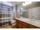 Standard bathroom with a shower/tub combination and a wood vanity with light countertops at 2934 W Peggy Dr, San Tan Valley, AZ 85144