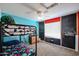 This is a bedroom featuring a unique bunk bed, blue walls and fun decor at 2934 W Peggy Dr, San Tan Valley, AZ 85144