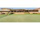 Spacious clubhouse has outdoor seating with scenic golf course views perfect for dining at 34 E Boca Raton Rd, Phoenix, AZ 85022