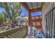 Enjoy views from this covered balcony overlooking lush landscaping and sunny skies at 3600 N Hayden Rd # 2310, Scottsdale, AZ 85251