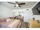 Bedroom with ceiling fan, closet, and sliding mirrored closet at 3600 N Hayden Rd # 2310, Scottsdale, AZ 85251