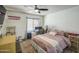 Bedroom with ceiling fan, desk, and carpet at 3600 N Hayden Rd # 2310, Scottsdale, AZ 85251