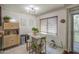 Inviting dining area with tile floors, patio access, and open layout, perfect for entertaining and relaxed meals at 3600 N Hayden Rd # 2310, Scottsdale, AZ 85251