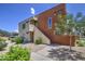Attractive two-story condo with a stucco exterior, low maintenance landscaping, and a bright blue sky at 3600 N Hayden Rd # 2310, Scottsdale, AZ 85251