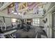 Bright gym with high ceilings, equipped with treadmills, exercise bikes and weights at 3600 N Hayden Rd # 2310, Scottsdale, AZ 85251