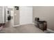 Neutral bedroom with a record player and record collection, next to the closet at 40918 W Hillman Dr, Maricopa, AZ 85138