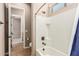 Tiled shower with tub combination at 4318 N 180Th Dr, Goodyear, AZ 85395