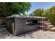 Modern hot tub with steps in a paver patio backyard setting at 4318 N 180Th Dr, Goodyear, AZ 85395